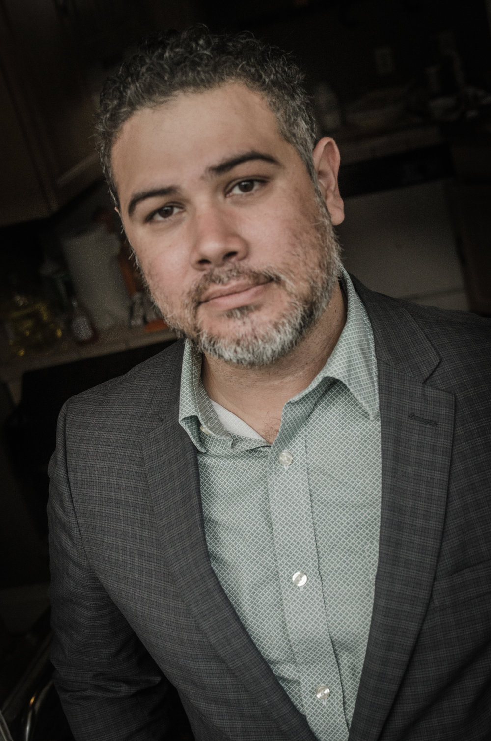 Manuel Gonzales is the author of The Miniature Wife and Other Stories , which won the Sue Kaufman Prize for First Fiction and the John Gardner Prize for Fiction, and the novel, The Regional Office Is Under Attack! A graduate of Columbia University's School of the Arts, he currently teaches creative writing at the University of Kentucky and the Institute of American Indian Arts. He lives in Kentucky with his wife and two kids. You can follow Manuel on Twitter @hrniles or find him online at everythingisunderattack.com .